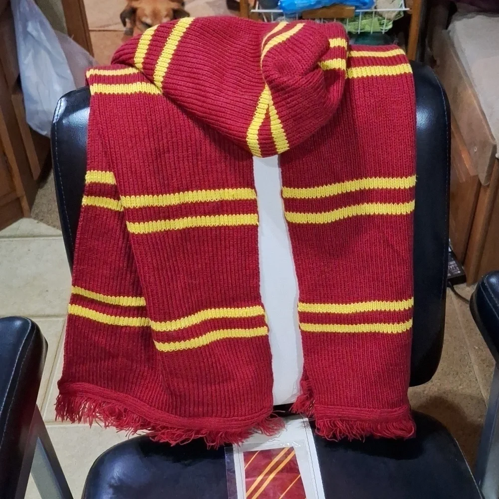 A Bella-Canvas Harry Potter Quidditch hoodie. Grey with red design.  Mens Large